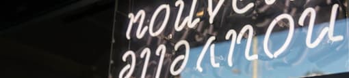 Neon sign that reads nouvelle