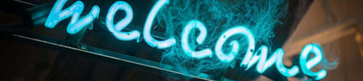 Neon sign that reads welcome
