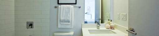 BeachHill Apartments bathroom featuring tub shower in Toronto, ON