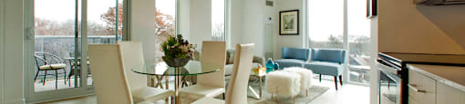 BeachHill Apartments open concept apartment featuring floor to ceiling windows with view of the balcony in Toronto, ON