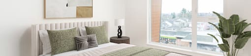 A bedroom with a large bed and a painting on the wall at 388 Kaslo East Village.