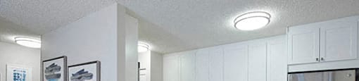Braemar Gardens apartments kitchen featuring stainless steel appliances and breakfast seating in Coquitlam, BC