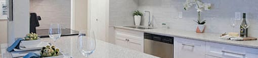 Braemar Gardens apartments kitchen featuring stainless steel appliances and white cupboards in Coquitlam, BC