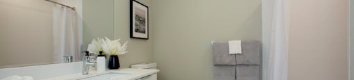 a bathroom with a toilet sink and bathtub