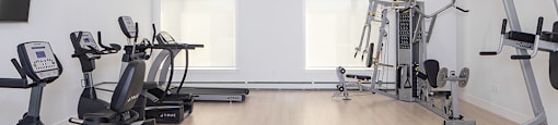 Gym with equipment at Brookline Apartments in Bedford NS