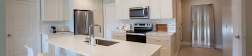 kitchen wit stainless steel appliances at Brookline Apartments in Bedford NS