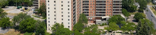 Exterior grounds with pool at Cambridge Place in Toronto, ON