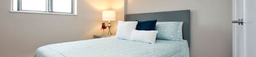 Highpoint Kitchener in Kitchener, ON brightly lit bedroom with window