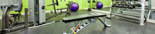 Cedarwoods Tower in Kitchener, ON gym with cardio machines and weights