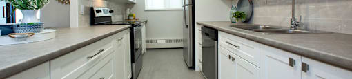 Cedarwoods Tower in Kitchener, ON kitchen with upgraded cabinetry and LED pot lights