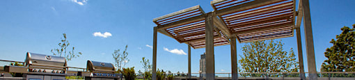 Cityview Apartments Gazebo next to two barbecues on a bright sunny day in Brampton, ON