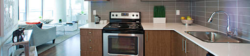 Kitchen with oven in the center at Cityview Apartments in Brampton, ON