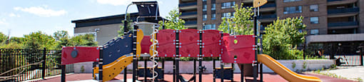 Children's playground with yellow slide