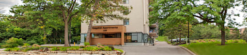 Edgehill Apartments in Barrie, ON showing front of building from street