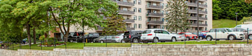 Edgehill Apartments in Barrie, ON side of building showing outdoor parking area