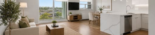 Harbourview Apartments penthouse suite  living  and dining room with kitchen in Oakville, ON