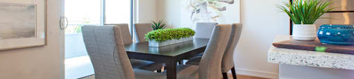 Harbourview Apartments dining area featuring walkout to balcony in Oakville, ON