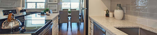Harbourview Apartments kitchen featuring stainless steel appliances in Oakville, ON