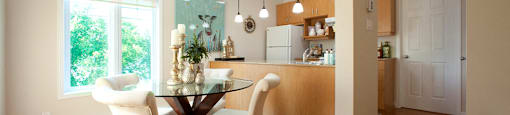 Heritage Lofts apartments kitchen and dining room with large windows in Gatineau, QC