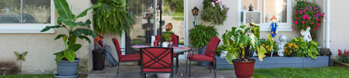 High Street Apartments private terrace featuring patio table set in Fort Erie, ON