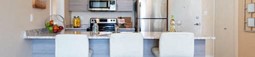 Hoylake Apartments in Victoria, BC kitchen with large breakfast bar