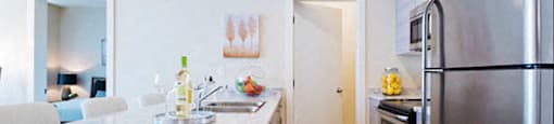 Hoylake Apartments in Victoria, BC kitchen with pantry for storage