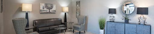 Hoylake Apartments in Victoria, BC building lobby with chairs and couch