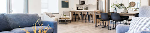 Inlet Glen Apartments Social Room featuring lounge seating and recessed lighting in Port Moody, BC