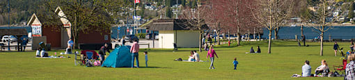 Inlet Glen Apartments in Port Moody, BC park with view of mountains