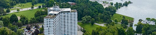 La Salle Towers building drone exterior featuring the lake and bridge in Burlington, ON
