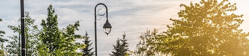 Evening view of walking trail steps from Le Saint-Laurent Apartments in Brossard
