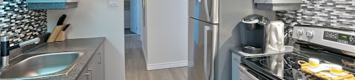 Les Jardins Hauterive in Sherbrooke, QC kitchen with stainless steel appliances