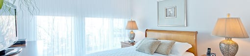 Lumineau in Sherbrooke, QC bedroom with hard surface flooring throughout