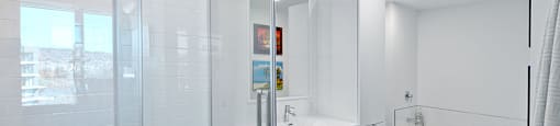 Lumineau in Sherbrooke, QC large bathroom with stand up and full sized bathub
