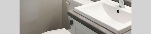 Miller Apartments in Sarnia. ON bathroom with upgraded cabinetry and countertop