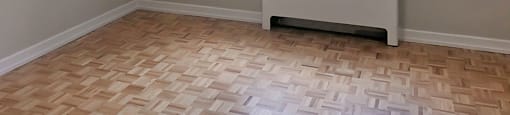 Miller Apartments in Sarnia. ON bedroom with large window and blinds