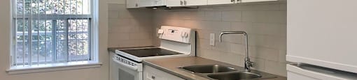 Miller Apartments in Sarnia. ON kitchen with modern cabinetry