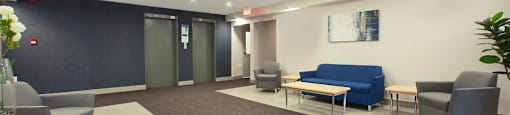 Millside Apartments renovated lobby with seating in Milton, ON
