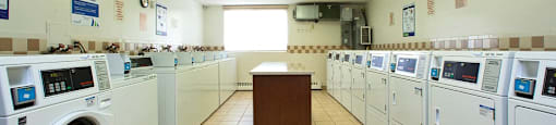 Millside Towers on-site laundry facility in Milton, ON