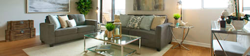 Millside Tower large living room with lots of natural light in Milton, ON