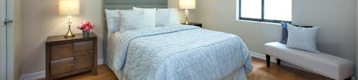 Northgate Towers large bedroom with hardwood flooring in Woodstock, ON