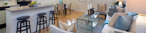 Northumberland Place open concept suite with view of kitchen and dining area from living room in Port Hope, ON