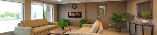 Northumberland Place lobby with seating area in Port Hope, ON