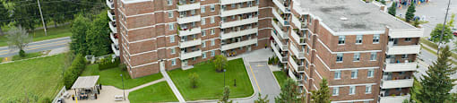 Northumberland Place image of drone exterior of building featuring the lake in Port Hope, ON