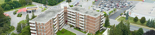 Northumberland Place image of drone exterior of building featuring the lake in Port Hope, ON