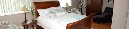 Dalhousie Place large bedroom with vinyl plank flooring in Amherstburg, ON