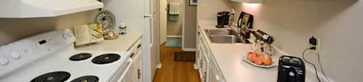 Dalhousie Place charming kitchen with full range stove in Amherstburg, ON