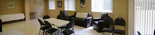 Dalhousie Place large social room with tables and chairs