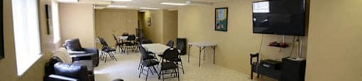 Dalhousie Place social room with couch seating area in Amherstburg, ON