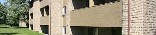 Kensington Apartments in Brockville, ON exterior of back of building suites with balconies